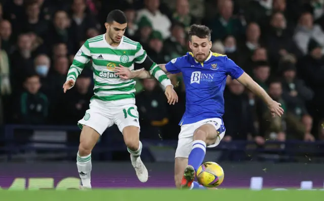 Celtic's Liel Abada (left) tackles St Johnstone's Callum Booth