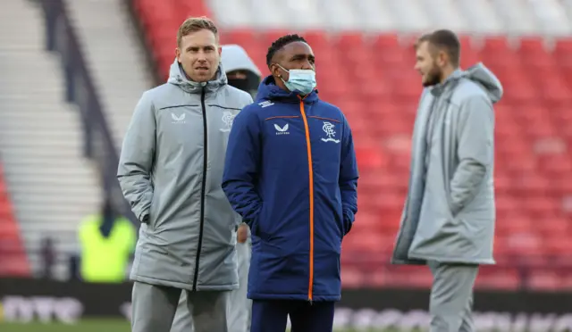 Rangers coach Jermain Defoe with Scott Arfield