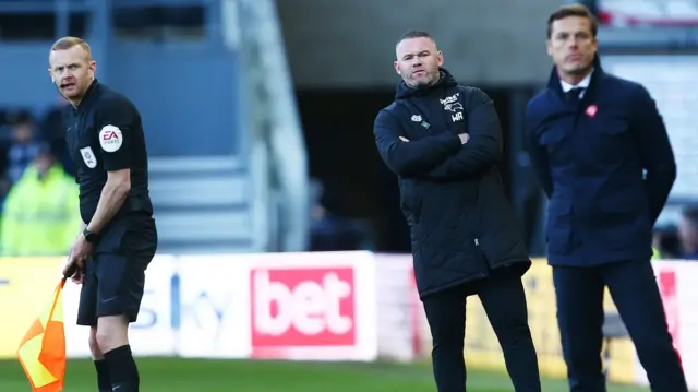 Managers Wayne Rooney and Scott Parker