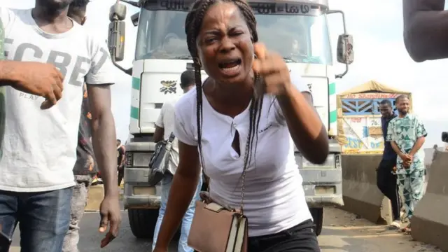 EndSars protesters gather to barricade the Lagos-Ibadan expressway, the oldest highway and major link to all parts of the country, on 16 October 2020