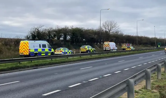 Police vehicles on A63