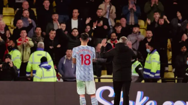 Bruno Fernandes and Ole Gunnar Solskjaer in front of fans