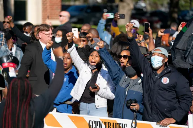 Supporters react to the verdict outside the Glynn County courthouse