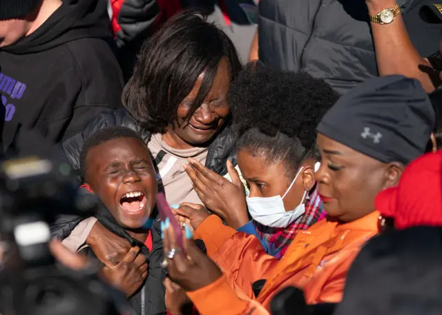 Members of Arbery's extended family react outside the courtroom