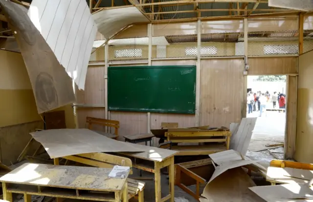 A view shows the debris of a classroom after a car exploded in a suicide attack near Mucassar primary and secondary school in Hodan district of Mogadishu, Somalia November 25, 2021