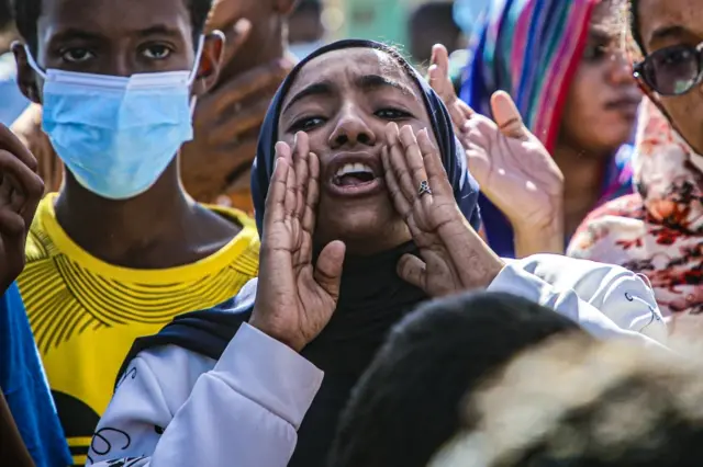 Sudanese anti-coup protesters take to the streets during a demonstration in Khartoum, Sudan.