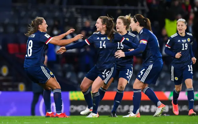 Scotland's Abi Harrison (left) celebrates making it 1-1