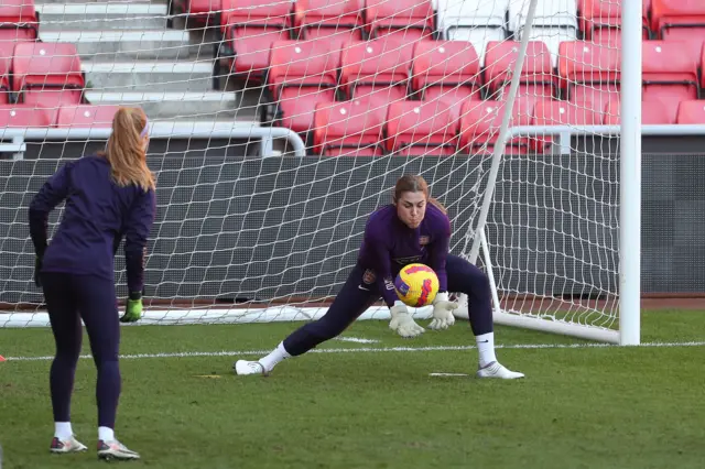 Mary Earps makes a save in training