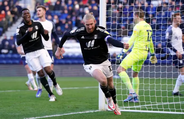 Tim Ream celebrates