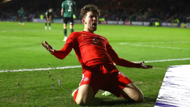 Callum Lang celebrates