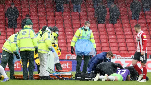 Nathan Baker receives treatment