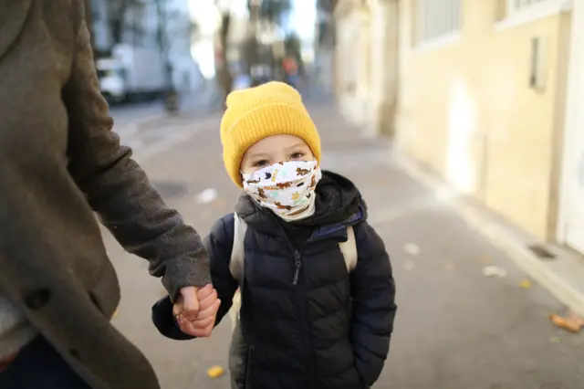 child wearing mask