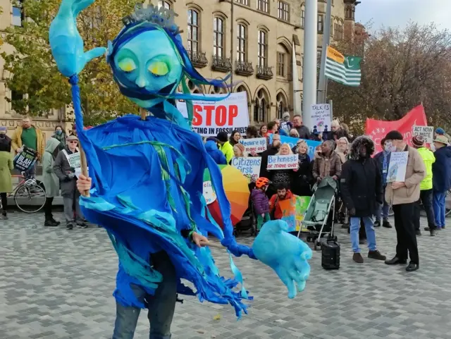 COP26 protest with puppet