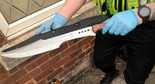 Police officer with knife