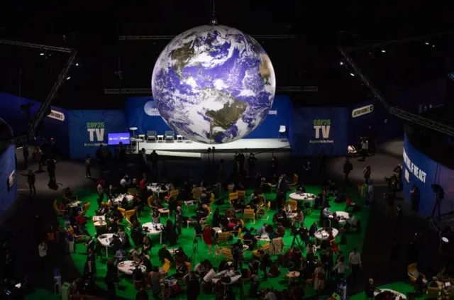 Attendees in the Blue Zone during the COP26 climate talks in in Glasgow, Britain