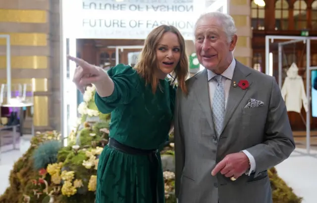 Britain"s Prince Charles speaks with fashion designer and sustainability advocate Stella McCartney as he views a fashion installation by the designer, at the Kelvingrove Art Gallery and Museum