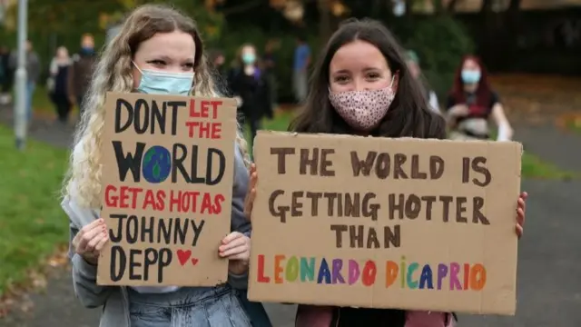 Activists with placards in Glasgow