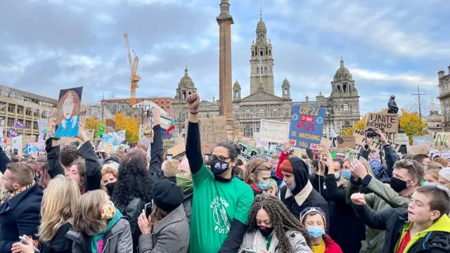 Climate activist attend a rally at George Square