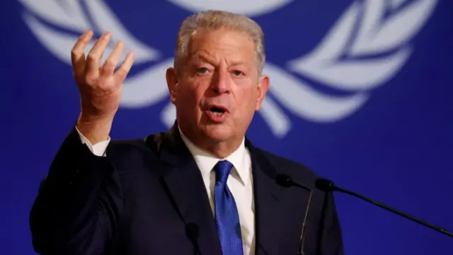 Al Gore speaks at a news conference during the COP26 summit in Glasgow