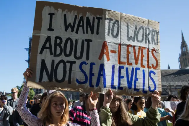 Hundreds of young people in Parliament Square take part in a Global Climate Strike to demand intersectional climate justice on 24th September 2021 in London, United Kingdom