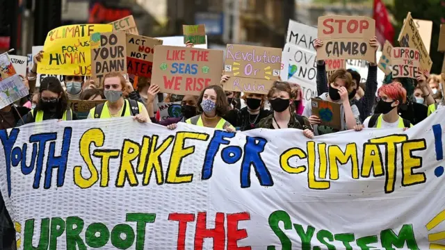 Young people take part in a school strike in Glasgow in September