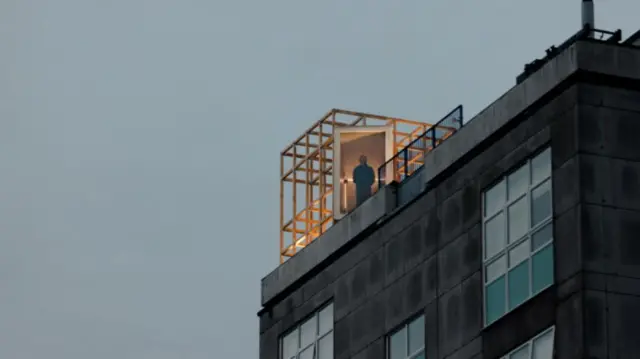 Man keeping vigil on top of Hull College