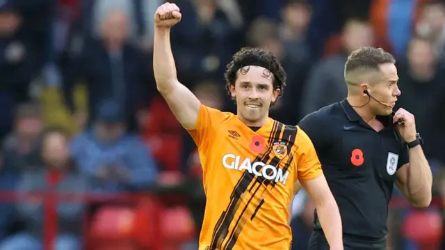 George Honeyman celebrates