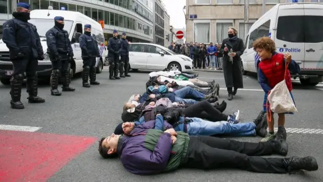 Extinction Rebellion activists block the Rue de la loi road during a protest in Brussels, Belgium