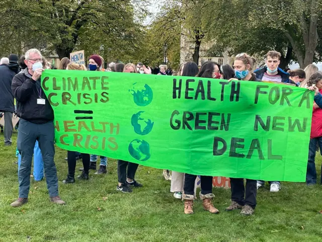 Protesters with a banner