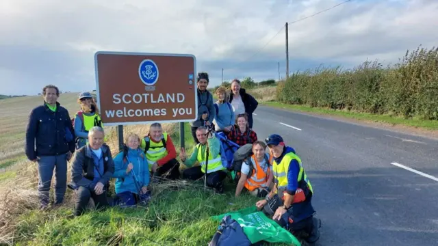 Becky and nine others walked more than 21 miles every day for 29 days straight to get to Glasgow