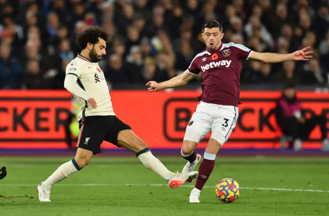 Mo Salah and Aaron Cresswell