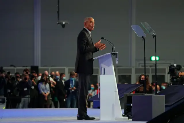 Former US president Barack Obama gives a speech during the Cop26 summit