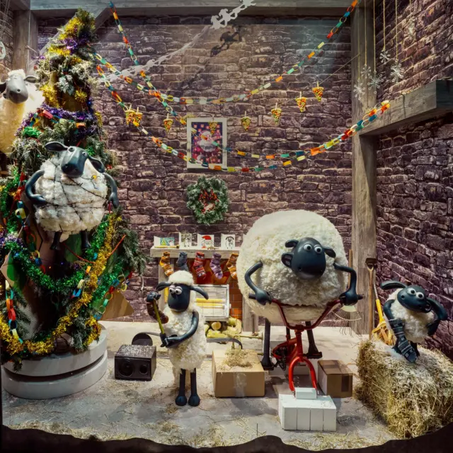 A scene showing Shaun the Sheep characters in the window