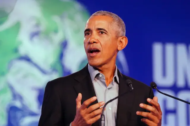 Former US president Barack Obama gives a speech during the Cop26 summit