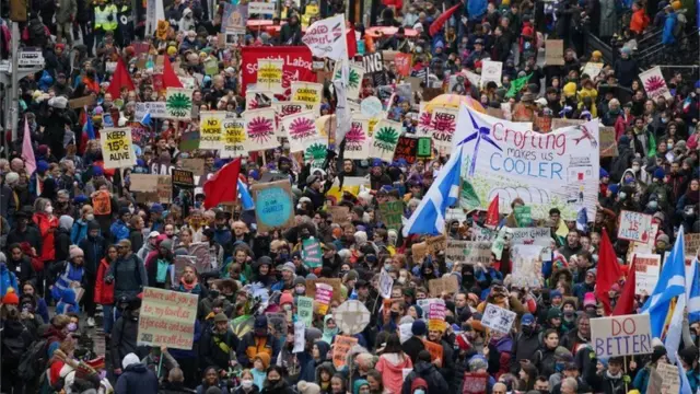 Tens of thousands of people marched through Glasgow on Friday