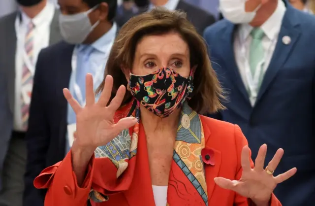 U.S. House Speaker Nancy Pelosi walks at the venue of the UN Climate Change Conference (COP26) in Glasgow