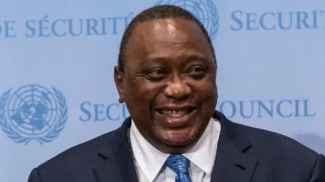 President Kenyatta laughing