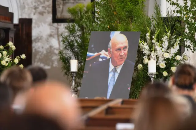 A portrait of former South African President FW de Klerk is seen during his state memorial service at the Groote Kerk church in Cape Town on December 12, 2021