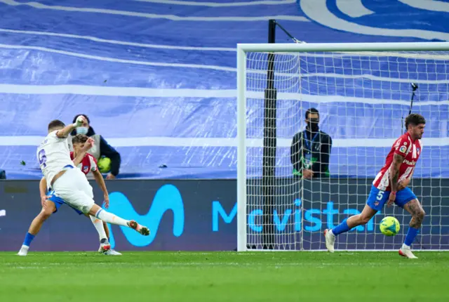 Karim Benzema scores