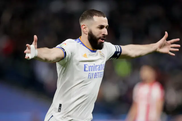 Karim Benzema scores