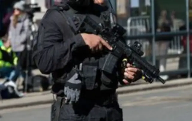 Armed police officer