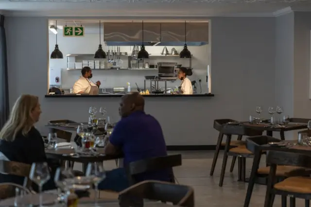 Couple eating at restaurant