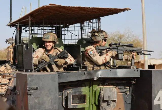 French soldiers of the Barkhane force patrol the streets of Timbuktu, northern Mali, on December 5, 2021.