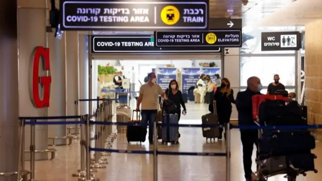 File photo showing passengers arriving at Tel Aviv Ben Gurion Airport on 28 November 2021