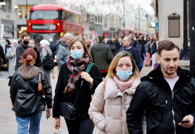 Shoppers wearing masks