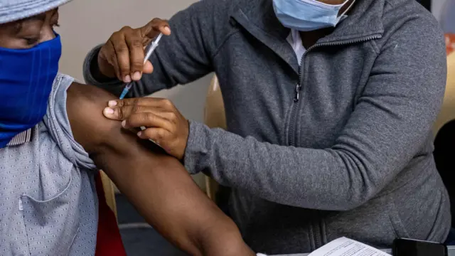 Man receiving vaccine