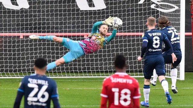 Dan Bentley saves a penalty