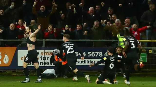 Cole Stockton celebrates his winner at Fleetwood