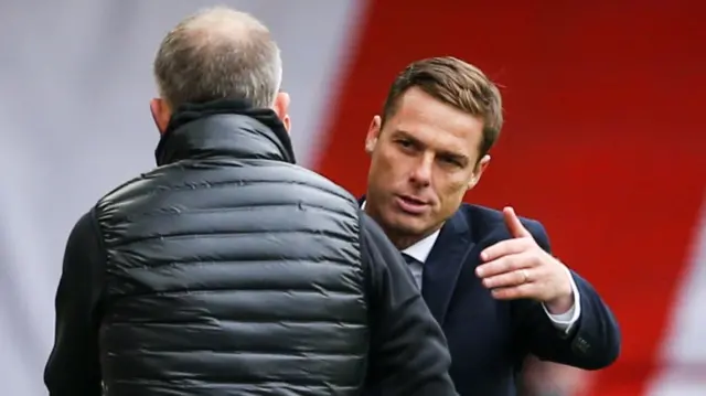 Scott Parker embraces Chris Wilder after the game