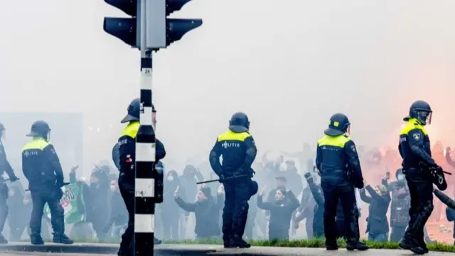 Supporters of Feyenoord gather near the Kuip stadium, Rotterdam, 19 December 2021